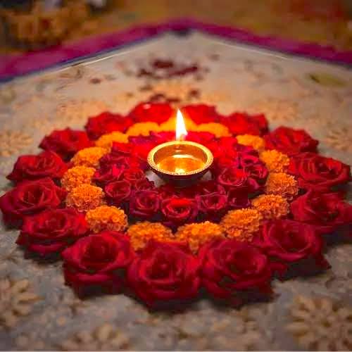 Diwali Flowers - The Meaning of Flowers in the Festival of Lights Diwali flower mandala with lamp