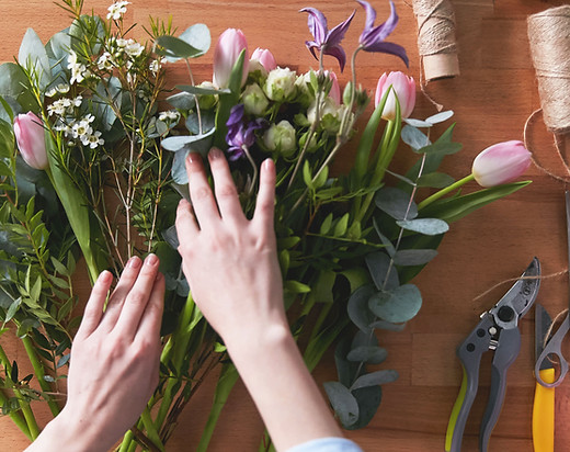 remove leaves that are going to be under water before arranging flowers