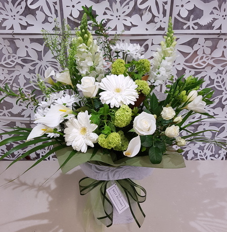 White flowers in water filled vox box