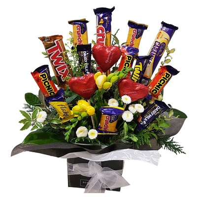 Chocolate bouquet Auckland – Choccie Potz edible-style chocolate arrangement with fresh greenery by Best Blooms.