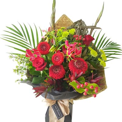 Mixed red flower bouquet with roses and seasonal red blooms – Auckland florist
