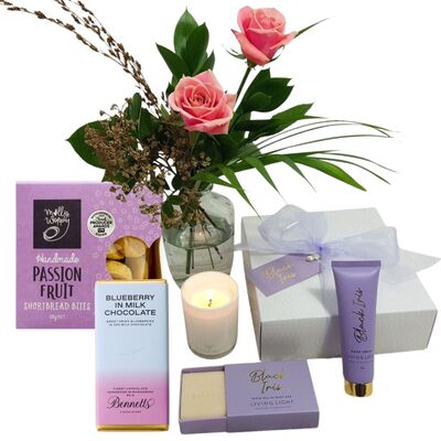 Romantic flowers and gift box for your wife with roses and chocolates