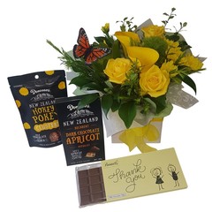 Thank you flowers & gifts box of Bennetts Thank you chocolate, Donovans chocolate hokey pokey, Box of Donovans Chocolates, fresh flower posy arranged in a posy box with yellow ribbon, and a keepsake orange monarch butterfly. Auckland NZ