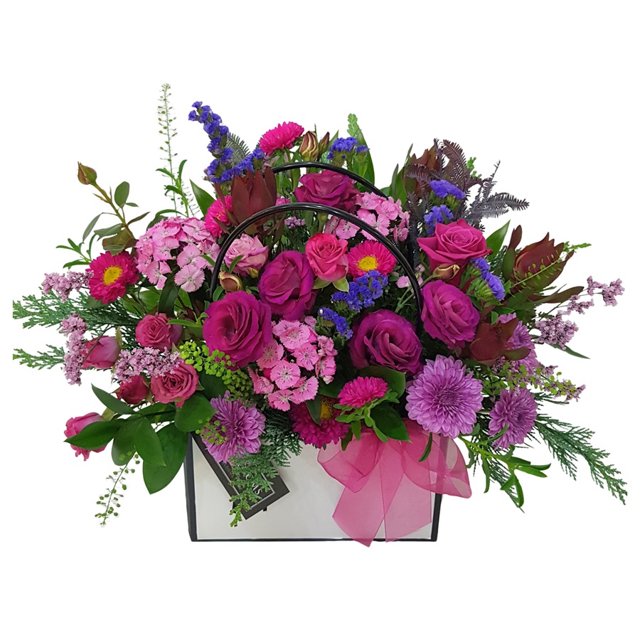 Berry Bliss Gift Package Handbag style flower arrangement in hot pink and purple tones