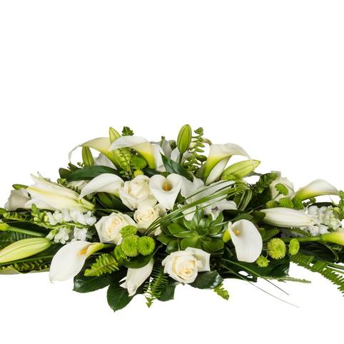 side view white floral casket spray auckland