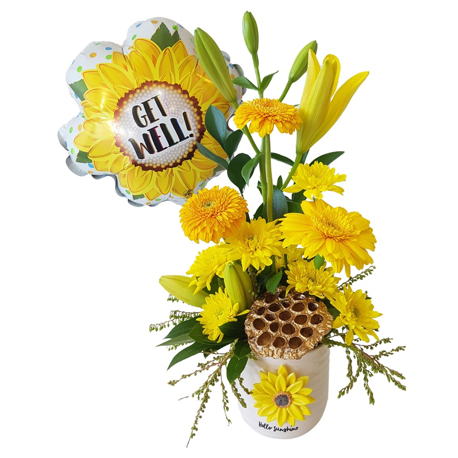 potted arrangement of fresh flowers with balloon in gift box