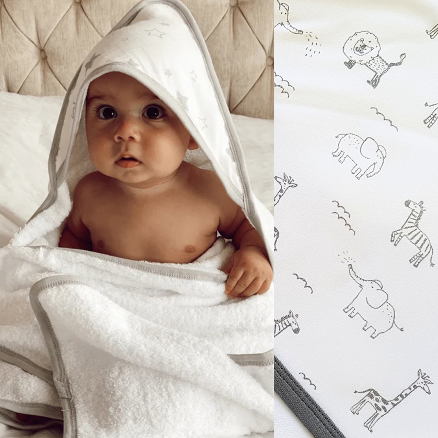 Extravagant Baby Gift Box - Boy OR Girl baby wearing a hooded cotton towel