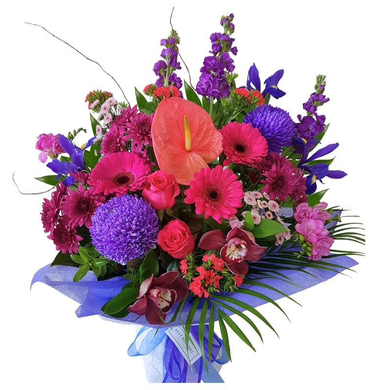 Pink and Purple Flowers in Bouquet with fresh White Wrapping