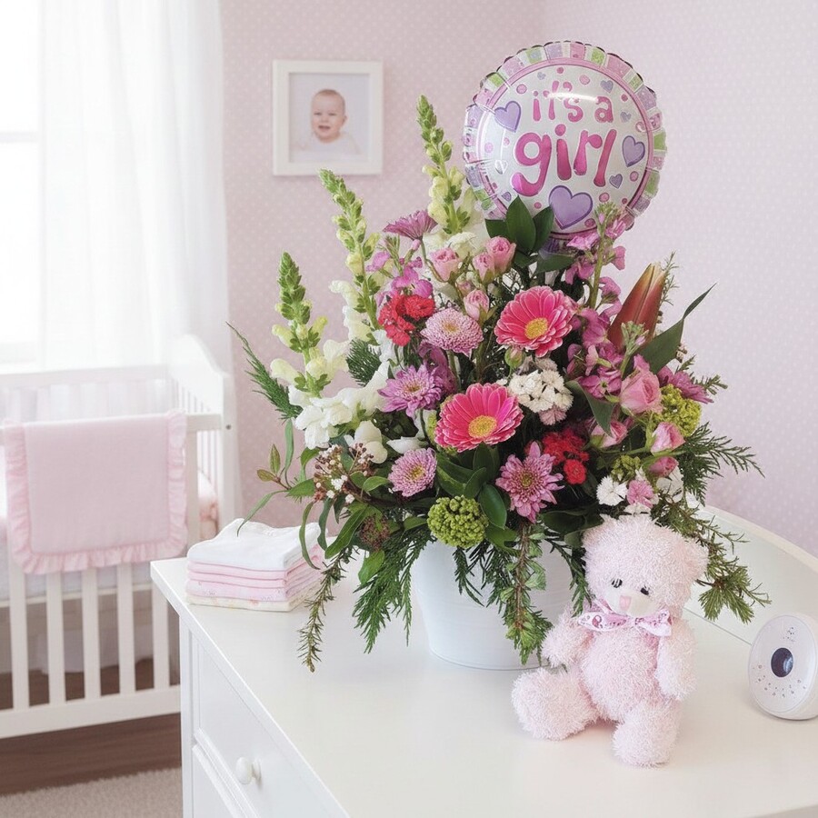 It's a Girl Baby Girl flowers, pink teddy and its a girl balloon in styled nursery scene