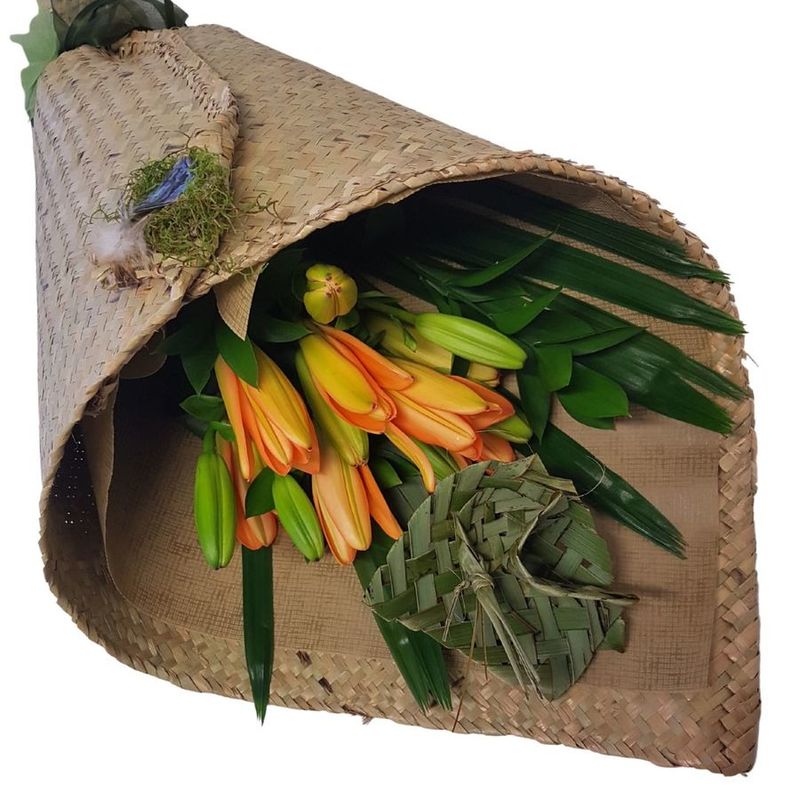 Maori style flax wrap bouquet. Kete wrap of orange asiatic lilies, flax flower & NZ paua shell detail with feathers