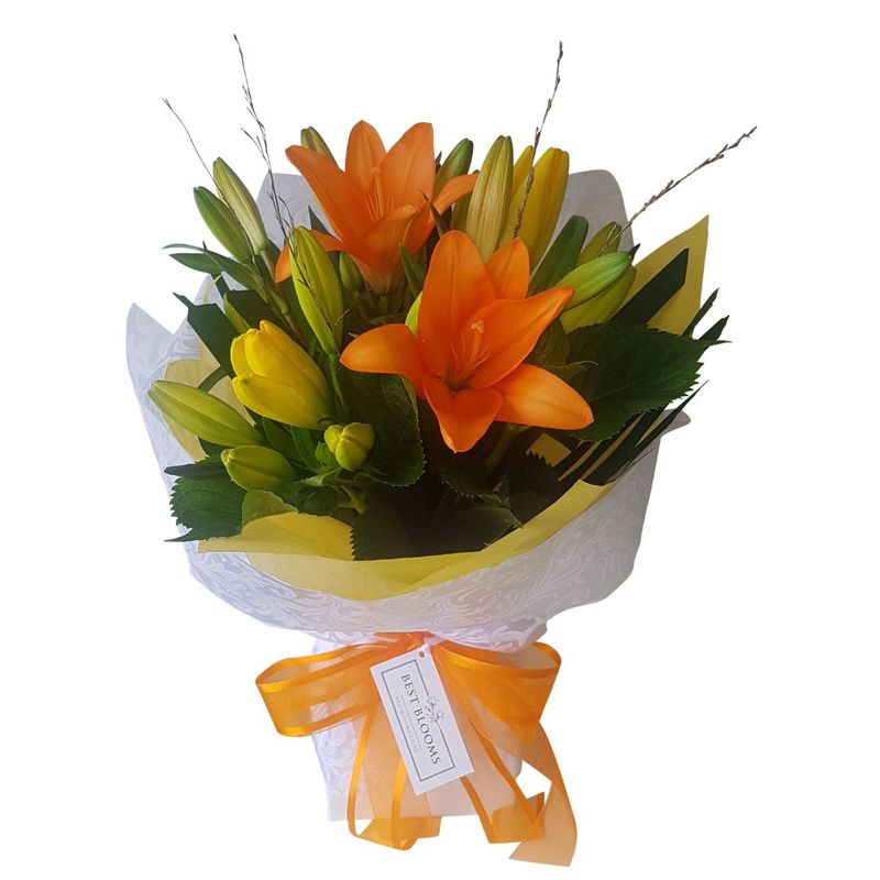 Bouquet of asiatic lilies in yellow and orange lilies