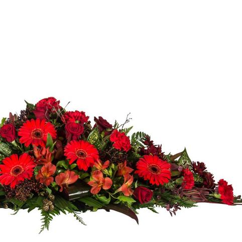 side view red floral casket spray