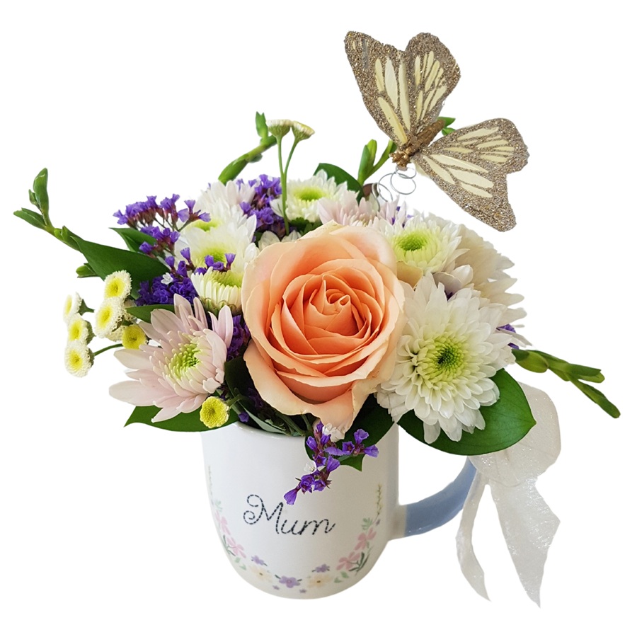 Fresh flower posy in a ceramic mug for Mum