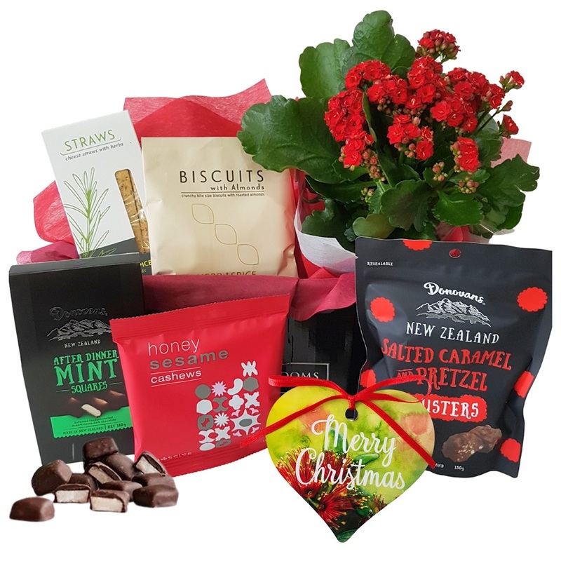 Christmas hamper with red flowering kalanchoe and New Zealand goodies