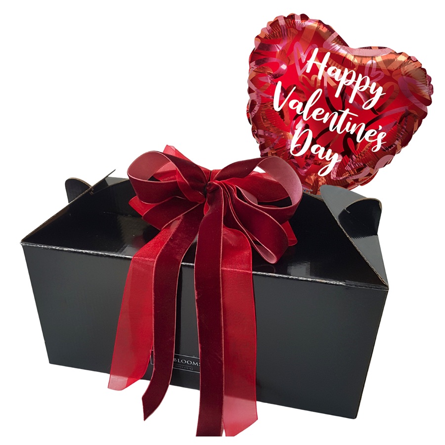 Wild About You gift basket in black carry box with Valentine balloon