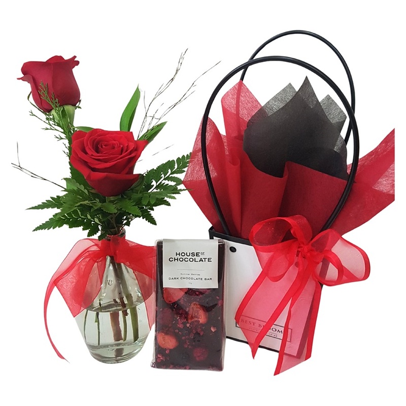 gift bag set of red roses in a vase and chocolate treat