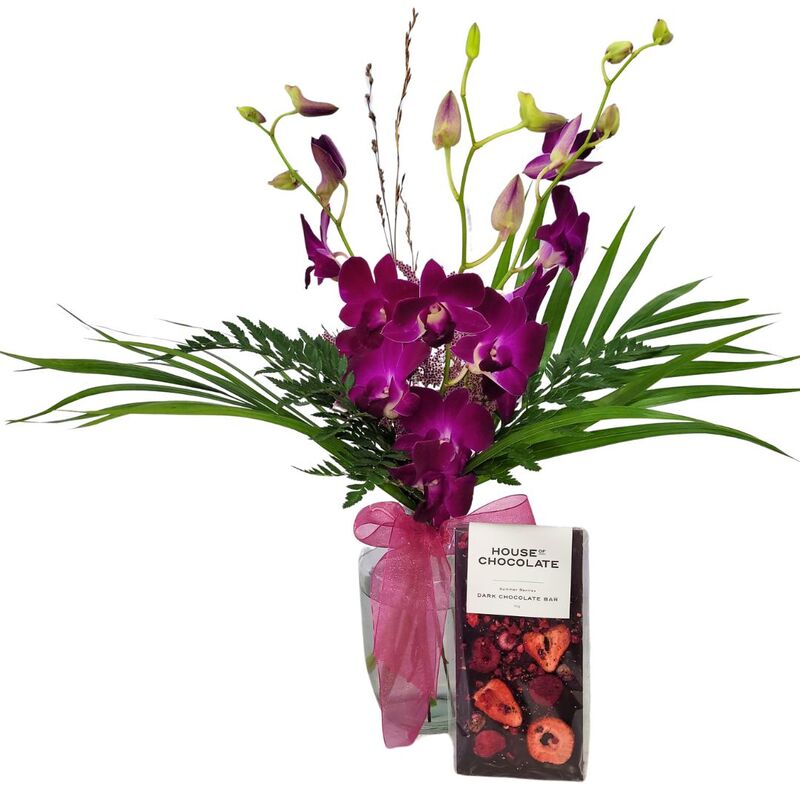 Purple Orchids in Glass Vase with House of Chocolate Bar