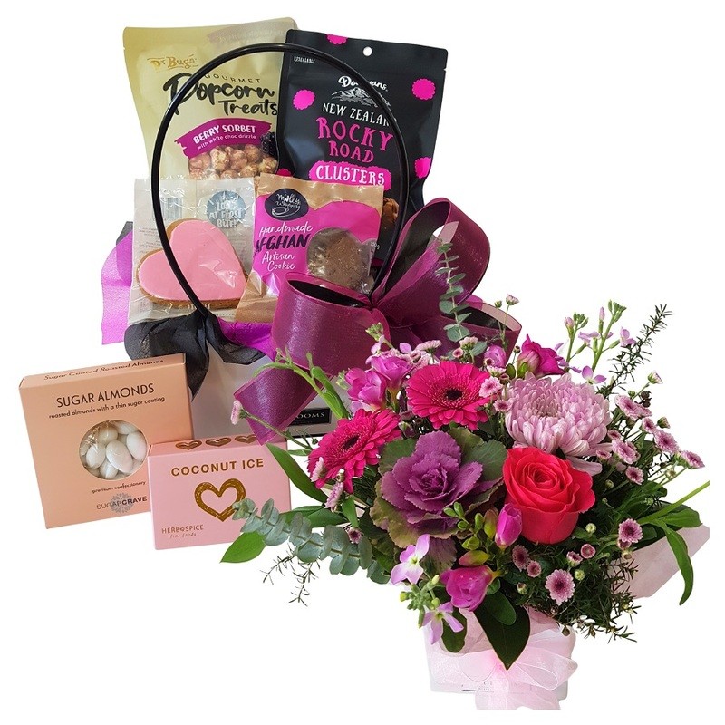 Sugar Babe Sweet Gift Box paired with a fresh pink flower posy, beautifully packaged for gifting in Auckland.