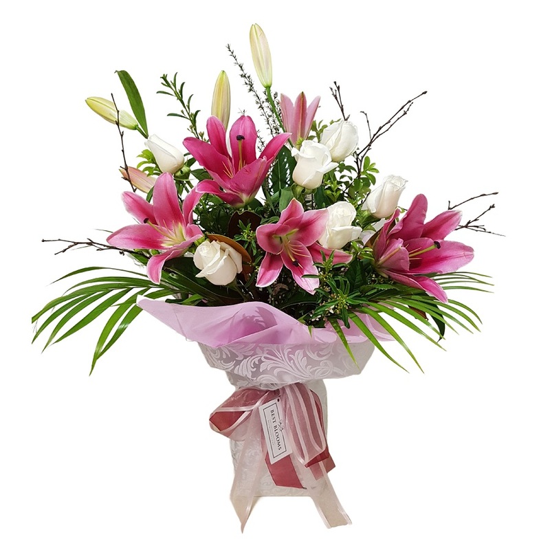 pink%20roses%20white%20lilies%20in%20pink%20wrapping%20bouquet%20, 