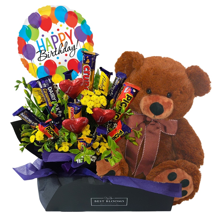 Teddy Loves Chocolate Box Teddy Loves Chocolate – chocolate bouquet with large teddy bear and birthday balloon, delivered in Auckland.