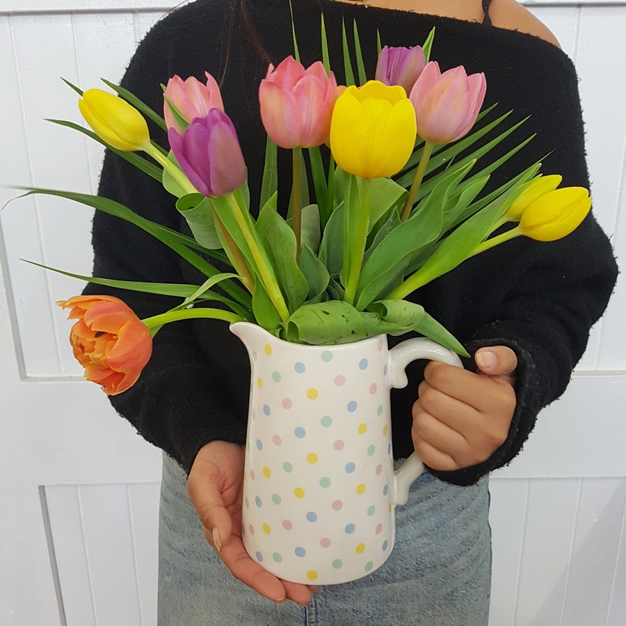 Fresh Tulips arranged in a Keepsake Polka Dot Ceramic Jug. Presented in white gift box with ribbon., 