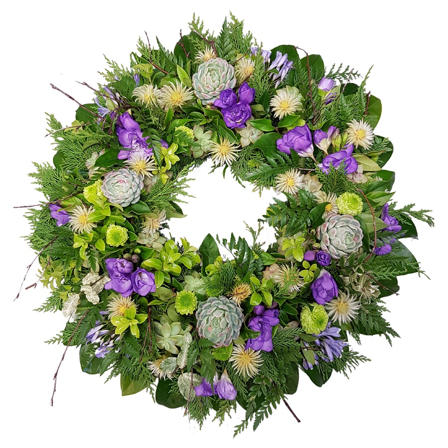Funeral wreath in greens natural garden style