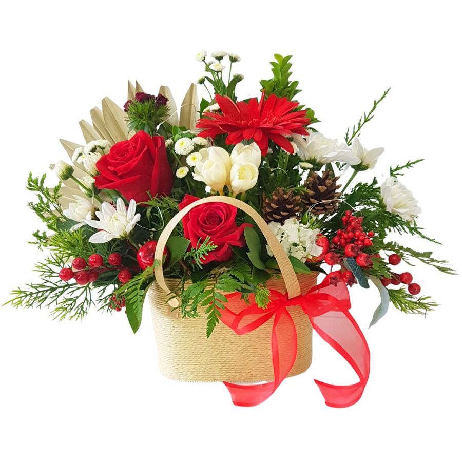 Christmas floral design in rustic wooden trug basket