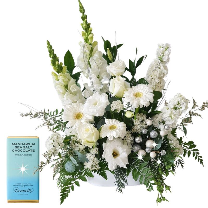 sparkly white Christmas flower arrangement with festive chocolate snowballs