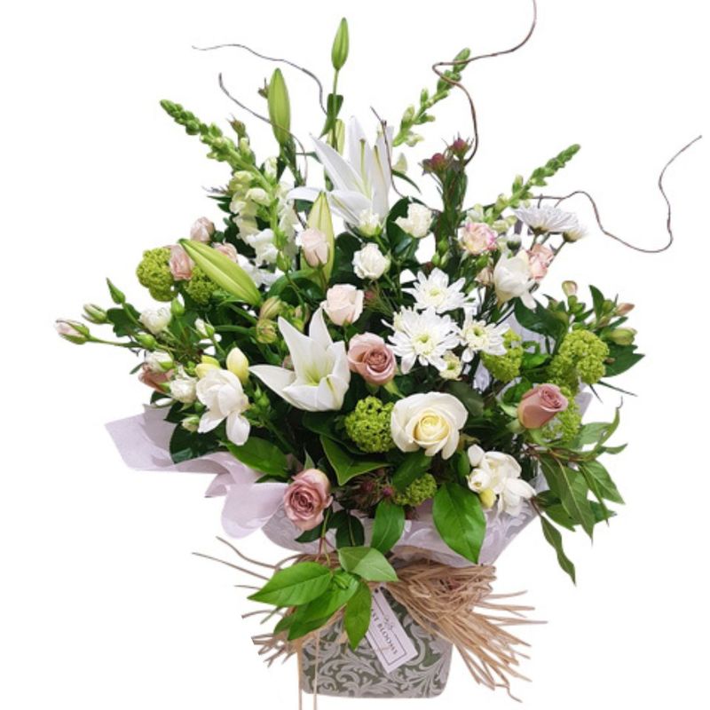 soft colour sympathy flowers