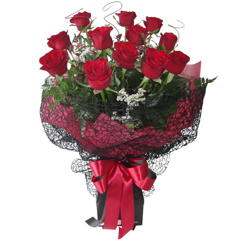 12 Red Valentines Roses. Free Auckland delivery in stylish black lace wrap and red satin ribbon bow, 