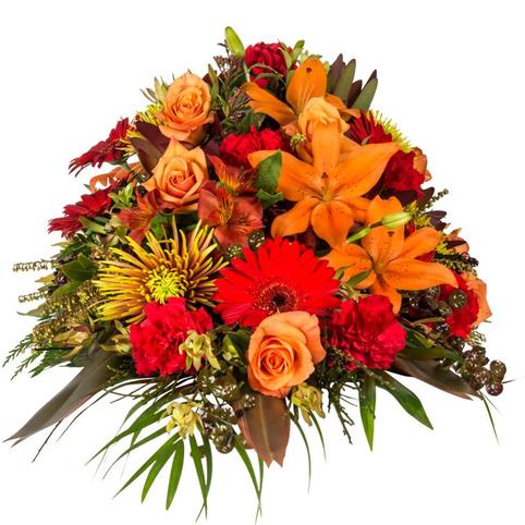 Autumn Tones Casket Spray front view autumn colours funeral casket spray. Flowers include Red Gerberas, Orange Roses, orange Lilies.