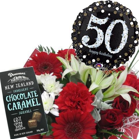Birthday Bouquet, Helium Balloon, Chocolates Package Birthday delivery auckland. Bright mixed florals with 50th Birthday helium balloon and NZ made Donovans chocolate caramels.