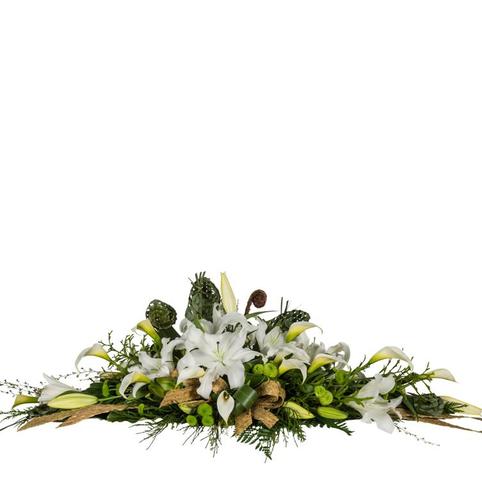 Kiwiana Lillies Casket Spray white lily floral casket spray with flax flowers