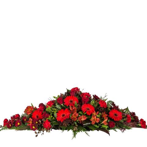 red flowers funeral casket spray
