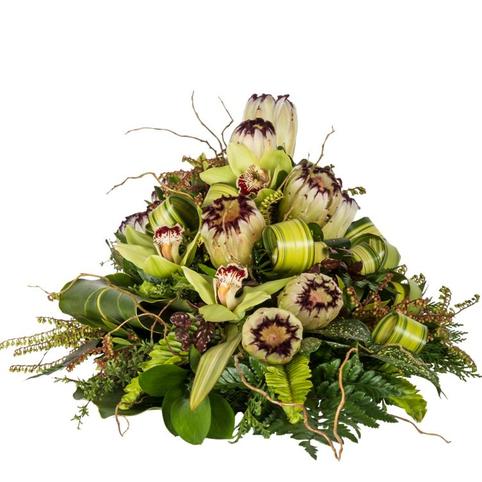 Masculine Design Casket Spray front view protea succulents casket spray flowers
