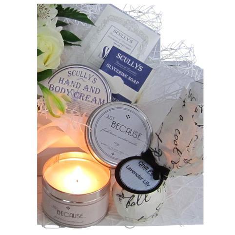 Relaxation Pamper Hamper close up of candle and gifts inlcuded in pamper basket