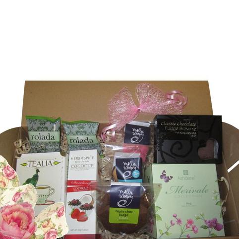Afternoon Tea Gift Box inside view of afternoon tea gift box showing pretty packaging of NZ made cookies and products.