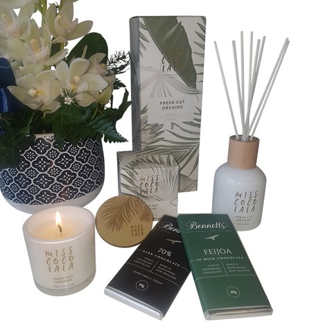 Miss Coco Lala Gift Box close up of products featured in the luxury orchid gift box