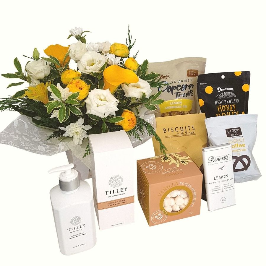 gift hamper full of tasty treats with a lemon meringue theme