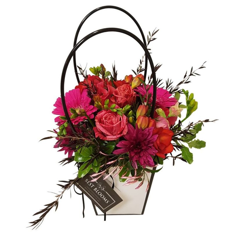 floral%20handbag%20in%20mixed%20pinks%20and%20reds, 
