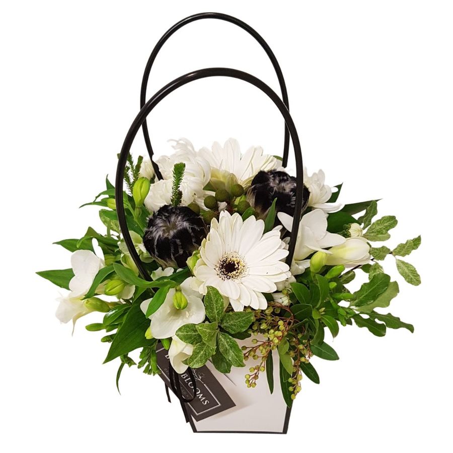 affordable flower design of mini handbag in whites and green gerberas and alstroemarias