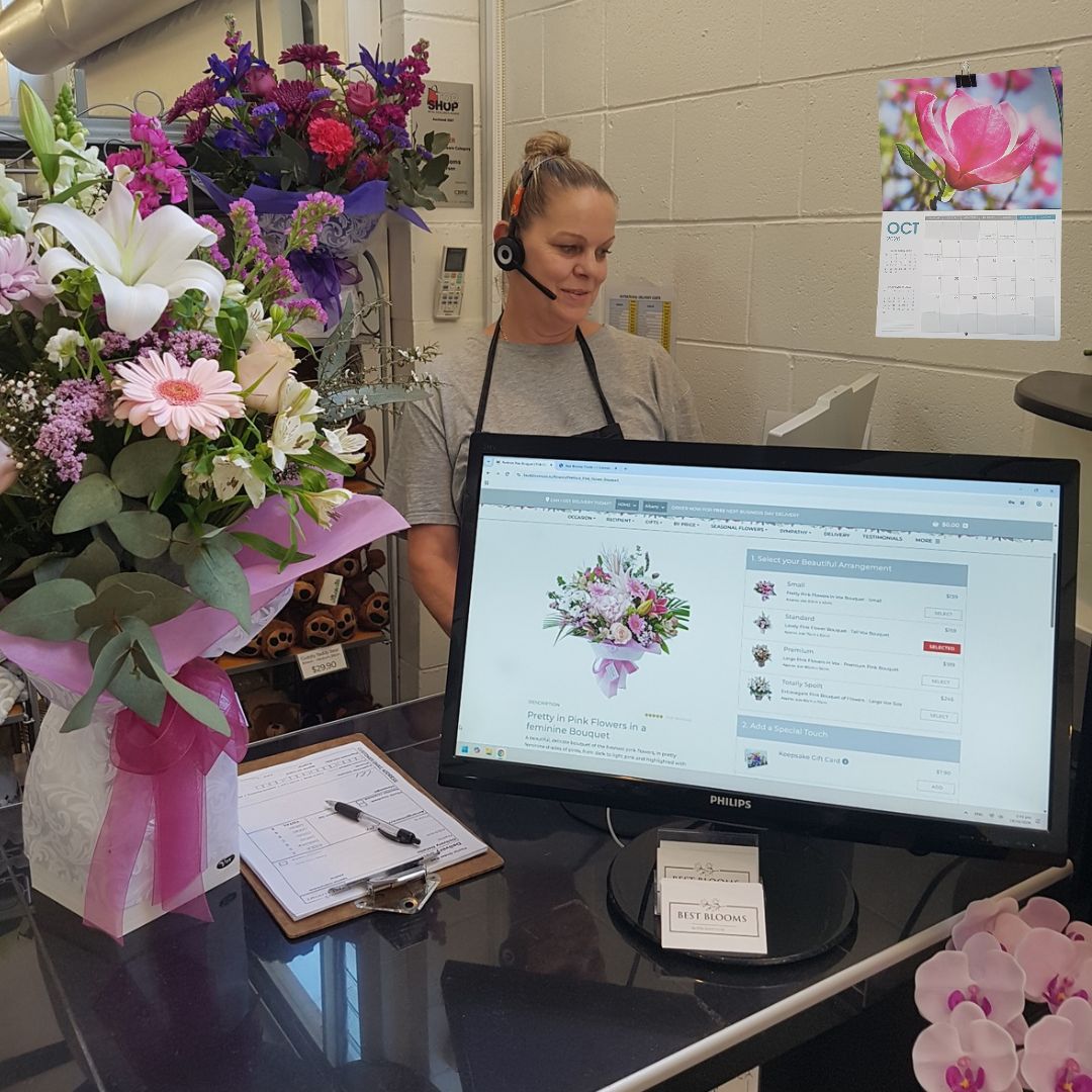 Customer Services taking a phone order at Best Blooms