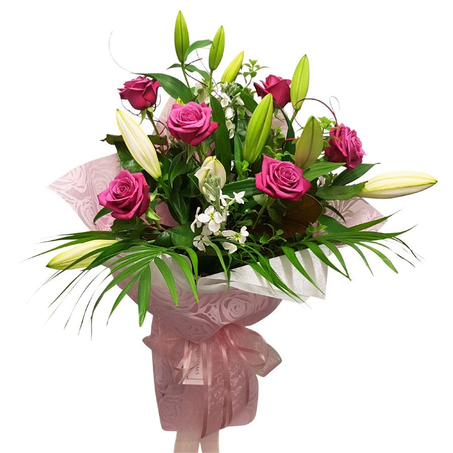 Sweetheart Bouquet Pink lilies and mauve roses in a romantic sweetheart bouquet