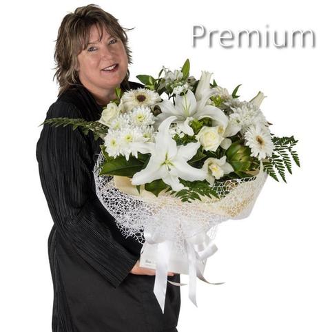 white funeral flower bouquet