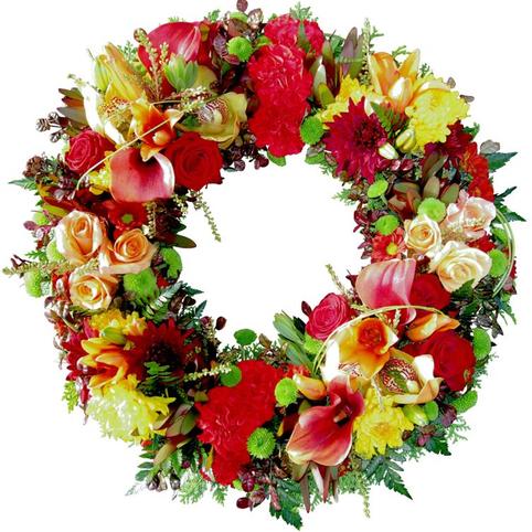Funeral wreath for a Man in autumn colours. Reds, Orange and Yellow Seasonal Flowers. Orange roses, red carnations, Yellow chrysanthemums, leucadendrons.