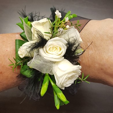 photo of purple orchid wrist corsage