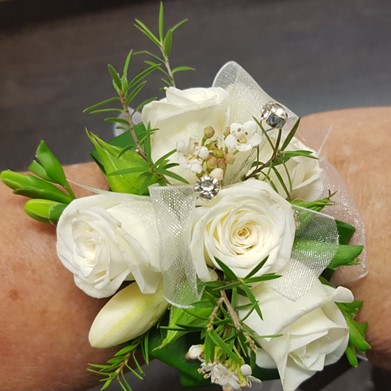 white miniature roses wrist corsage