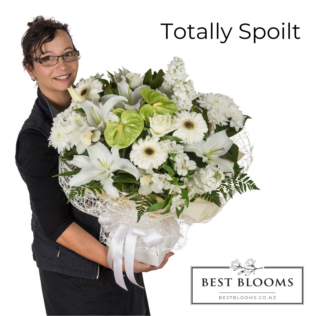senior florist donna holding the totally spoilt size