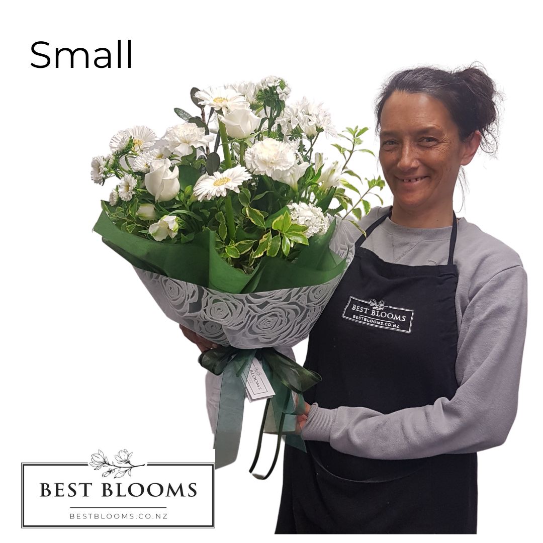 Size of Small White Bouquet with one of our florists holding to show size